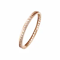 Bracelet Akillis bangle Capture Me en or rose semi pavé de diamants