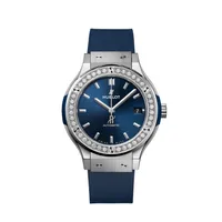 Montre CLASSIC FUSION TITANIUM BLUE DIAMONDS Bracelet caoutchouc ligné bleu, Boucle déployante en acier, Cadran soleillé bleu satiné