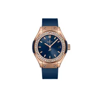 Montre CLASSIC FUSION KING GOLD BLUE DIAMONDS Bracelet caoutchouc ligné, Boucle déployante en King Gold, Cadran soleillé bleu satiné