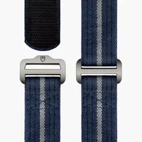 Montre PELAGOS FXD lunette céramique mate bleue, Bracelets tissu auto-grippant bleu marine avec bande grise et caoutchouc bleu marine motif tissé et boucle ardillon en titane, Cadran bleu marine index
