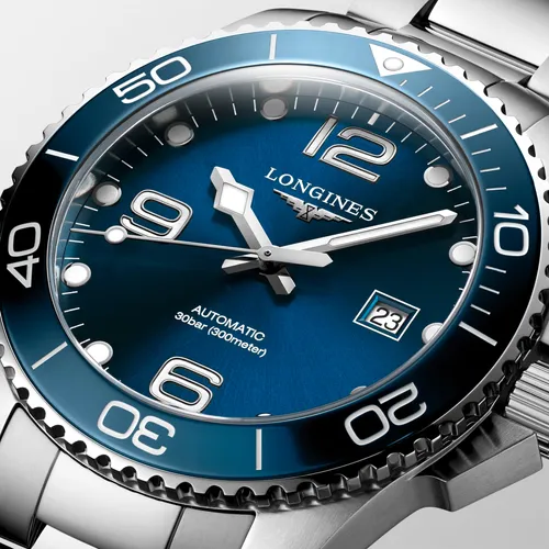 Montre HYDROCONQUEST lunette céramique Bracelet acier, Cadran bleu soleillé - LONGINES
