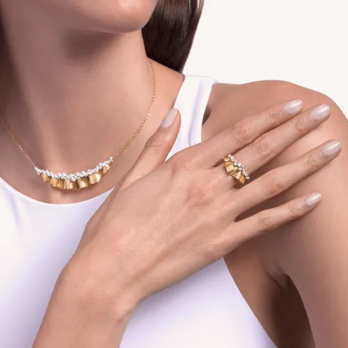 Bague Palmiero Rays of Sun en or rose et diamants.