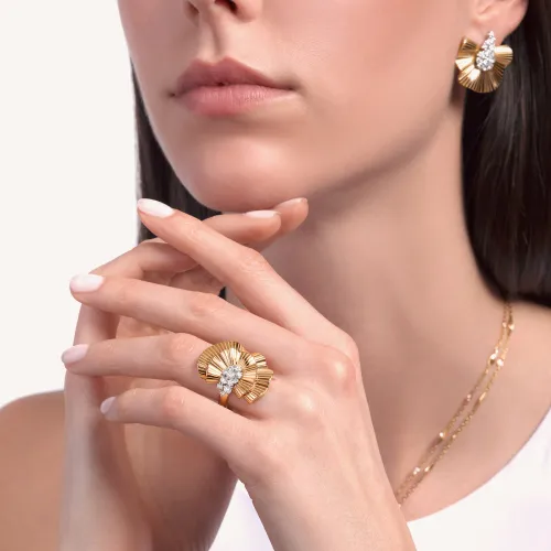 Boucles d'oreilles Palmiero Rays of Sun en or rose et diamants.