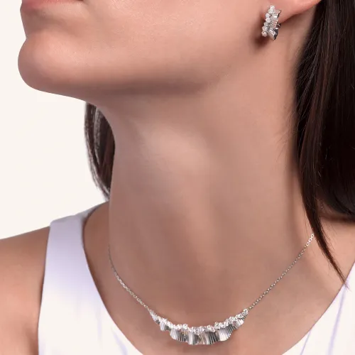 Boucles d'oreilles Palmiero Rays of Sun en or blanc et diamants.