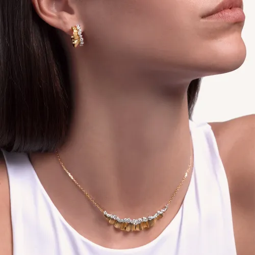 Boucles d'oreilles Palmiero Rays of Sun en or rose et diamants.