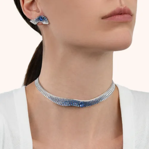 Pendentif Palmiero Abissi en or blanc et saphirs bleus et diamants.