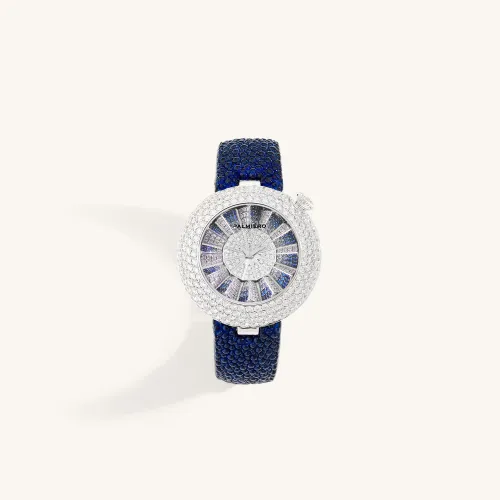 Montre Palmiero Alter en or blanc et saphirs bleus et diamants.