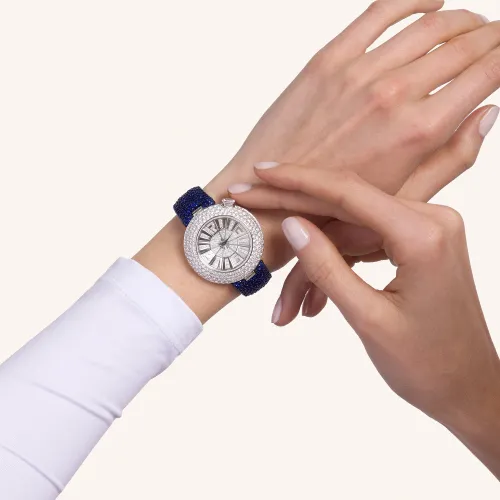 Montre Palmiero Alter en or blanc et saphirs bleus et diamants.