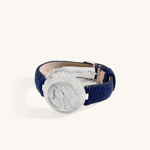 Montre Palmiero Alter en or blanc et saphirs bleus et diamants.
