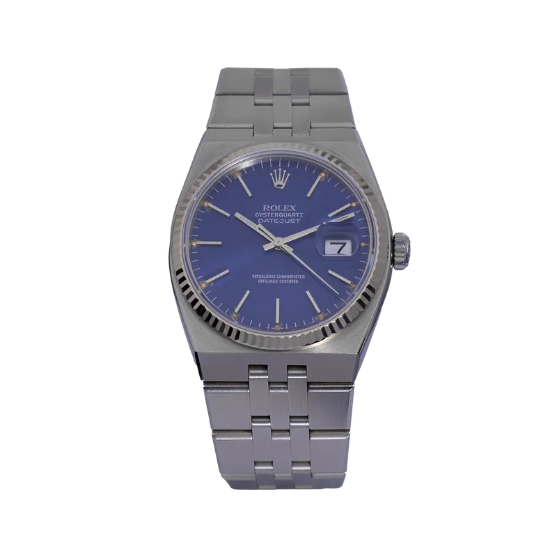 Montre Rolex Oysterquartz 36mm en acier, cadran bleu, lunette cannelée, bracelet jubilé oysterquartz