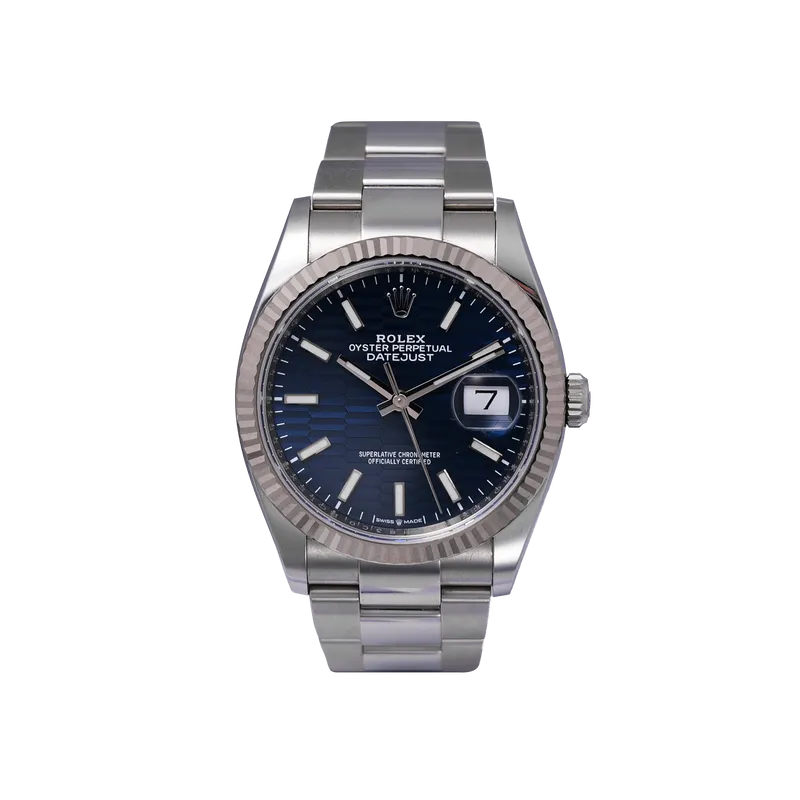 DateJust en acier, cadran bleu nid d'abeille, lunette cannelée, bracelet oyster en acier. 